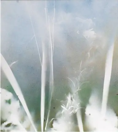 A spray paint artwork immersed in white tones creating an ethereal atmosphere.